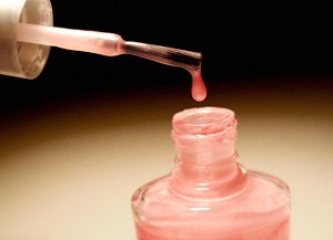 Pink nail polish.